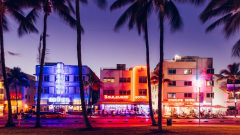 Neon light illuminated buildings along Ocean Drive in Miami, Florida,