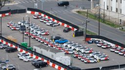 Aerial view of a parking lot filled with multiple GM Cruise self-driving cars in Austin, Texas, March 9, 2023.