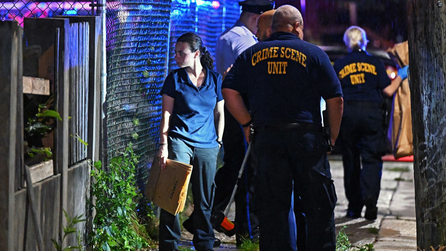 Police work the scene of a mass shooting in Philadelphia on July 3, 2023. The US typically sees a spike in mass shootings on and around July 4, according to the Gun Violence Archive.