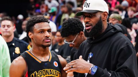 HOUSTON, TEXAS - MARCH 28: Bronny James #6 of the West team talks to Lebron James of the Los Angeles Lakers after the 2023 McDonald's High School Boys All-American Game at Toyota Center on March 28, 2023 in Houston, Texas. (Photo by Alex Bierens de Haan/Getty Images)