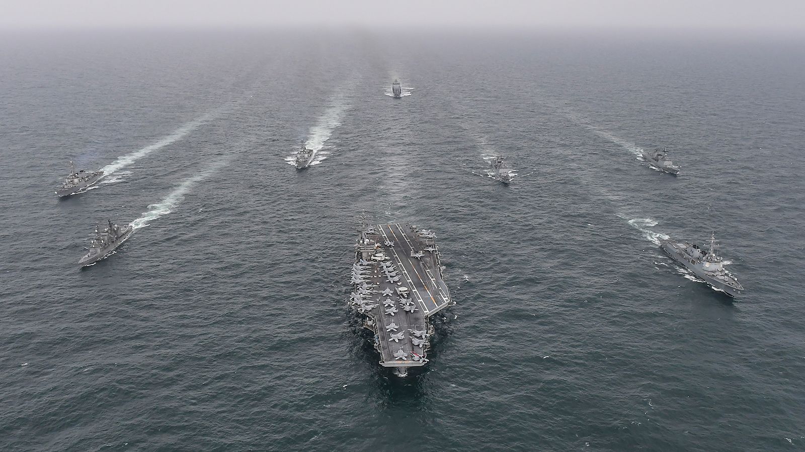 South Korean, American and Japanese naval vessels sail in formation during a joint exercise in international waters off South Korea's southern island of Jeju last year.
