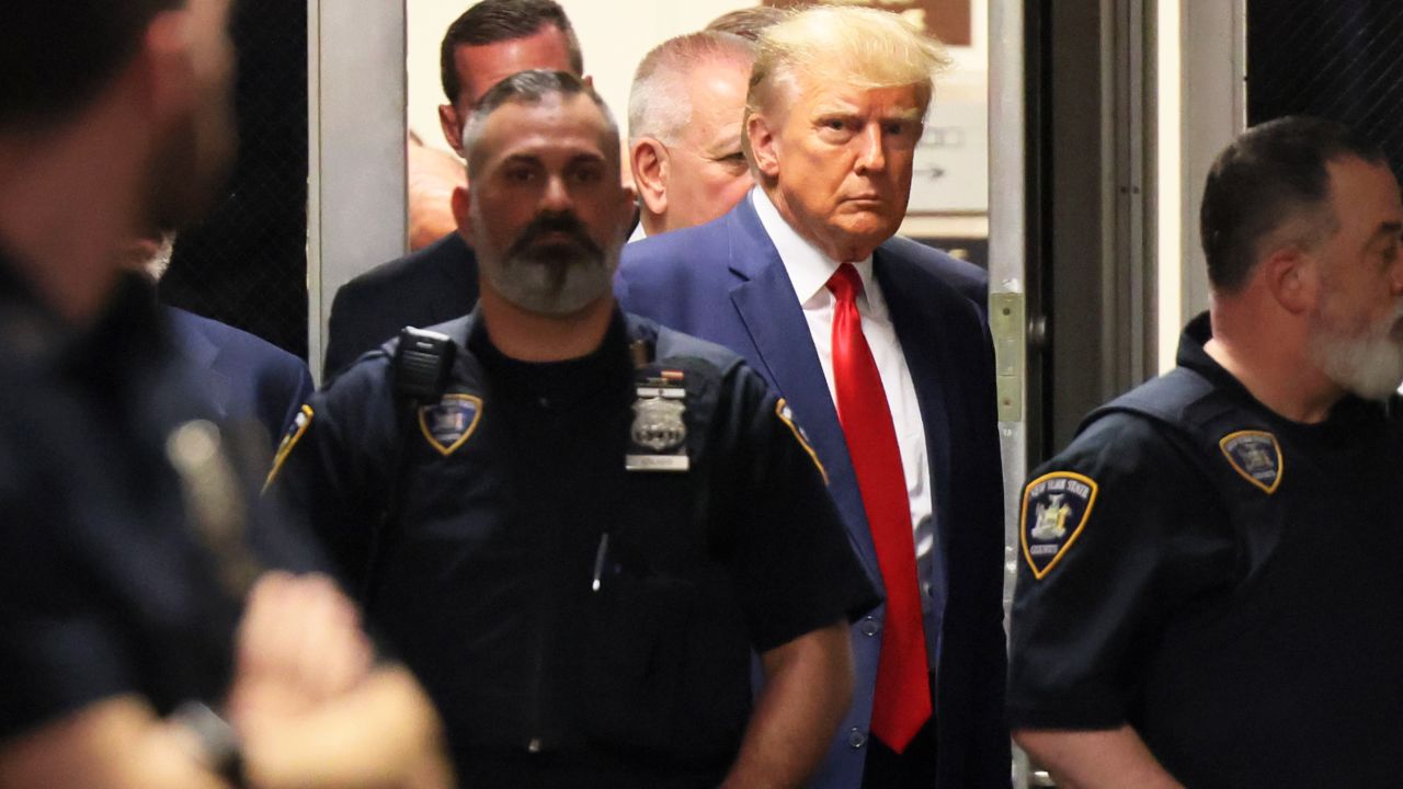 NEW YORK, NEW YORK - APRIL 04: Former President Donald Trump arrives for an arraignment hearing at NYS Supreme Court on April 04, 2023 in New York City. Former President Trump will be arraigned during his first court appearance following an indictment by a grand jury that heard evidence on hush money paid to an adult film star before the 2016 election. He becomes the first former U.S. president to face criminal charges. Charges remain under seal and have not been made public. (Photo by Michael M. Santiago/Getty Images)