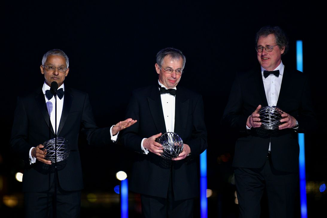 Chemists (from left) Shankar Balasubramanian and David Klenerman and biophysicist Pascal Mayer stand onstage at the Ninth Breakthrough Prize ceremony in April 2023 in Los Angeles.