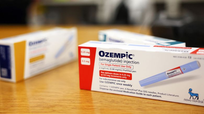 In this photo illustration, boxes of the diabetes drug Ozempic rest on a pharmacy counter on April 17, 2023 in Los Angeles, California.