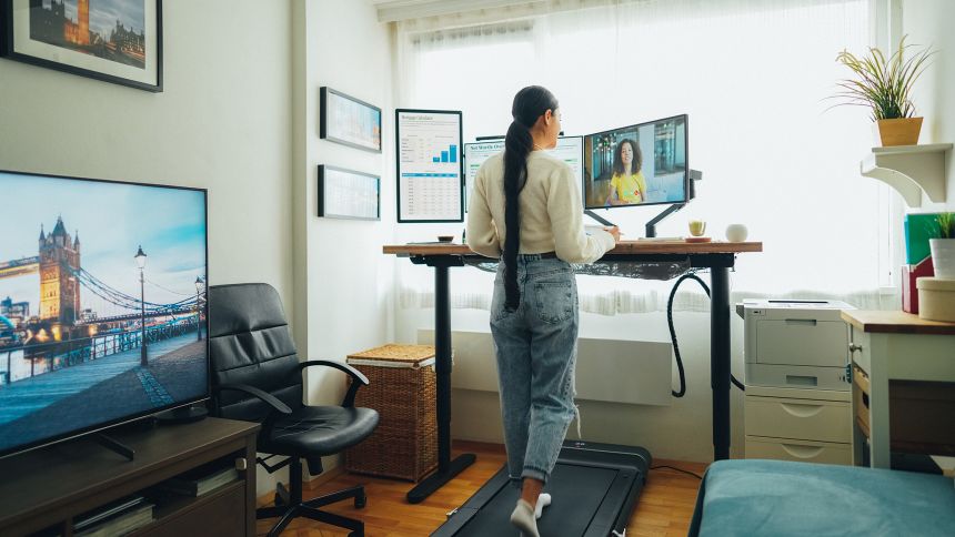 Using a desk treadmill is one easy way to fit exercise into a busy schedule.