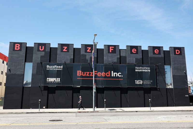 LOS ANGELES, CALIFORNIA - APRIL 20: A person walks past BuzzFeed offices in the Hollywood neighborhood on April 20, 2023 in Los Angeles, California. BuzzFeed News, which won a Pulitzer Prize in 2021 for reporting on the mass detention of Muslims in China, is shutting down as its parent company, Buzzfeed Inc., cuts costs. (Photo by Mario Tama/Getty Images)