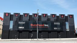 LOS ANGELES, CALIFORNIA - APRIL 20: A person walks past BuzzFeed offices in the Hollywood neighborhood on April 20, 2023 in Los Angeles, California. BuzzFeed News, which won a Pulitzer Prize in 2021 for reporting on the mass detention of Muslims in China, is shutting down as its parent company, Buzzfeed Inc., cuts costs. (Photo by Mario Tama/Getty Images)
