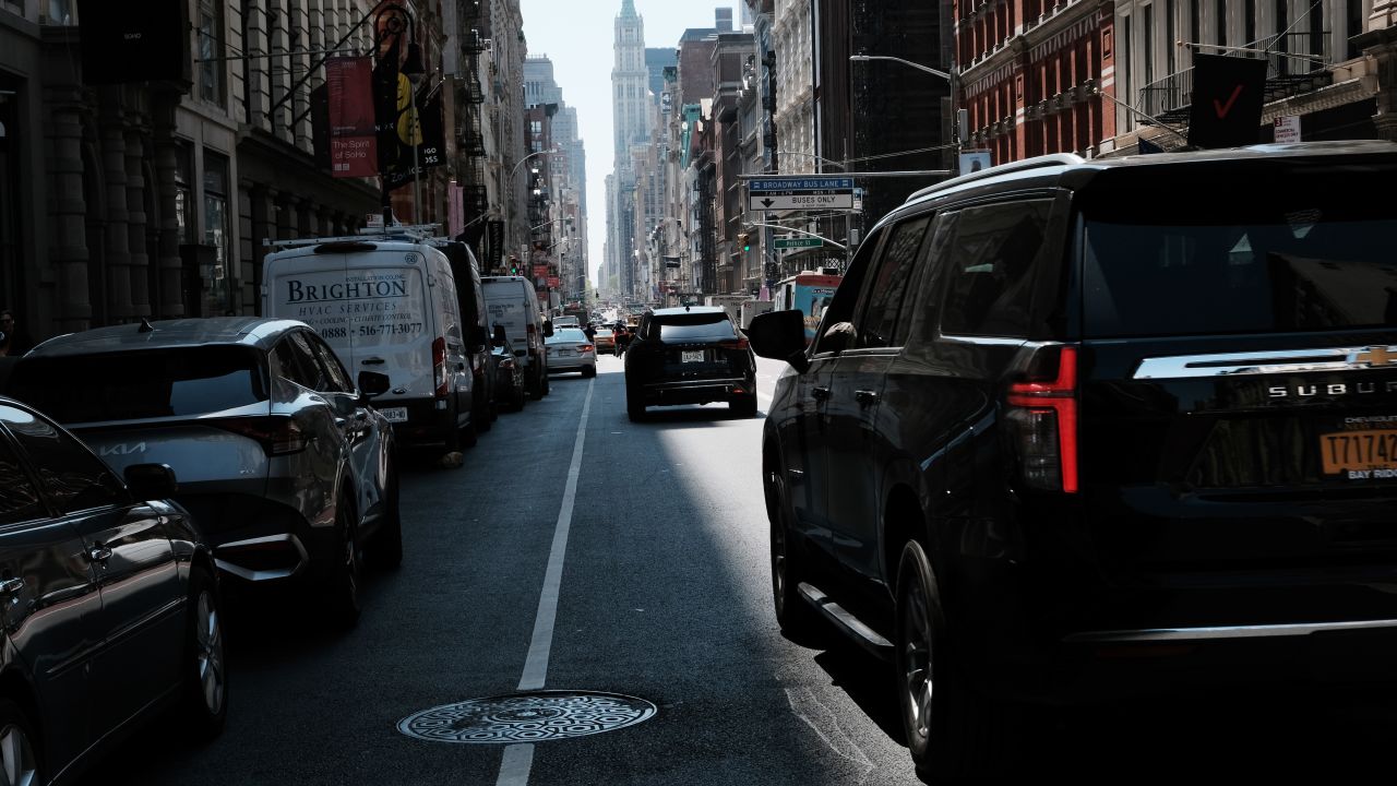 NEW YORK, NEW YORK - APRIL 21: Traffic moves through downtown Manhattan on April 21, 2023 in New York City. Local politicians and transit advocates are demanding the immediate implementation of New York’s Central Business District (CBD) Tolling Program, also known as “congestion pricing." The program, which has been signed into law, will charge travelers a variable fee for driving into Manhattan’s Central Business District, defined as any area south of 61st Street. ers claim the program will lead to safer streets, less traffic and less pollution in the air. (Photo by Spencer Platt/Getty Images)