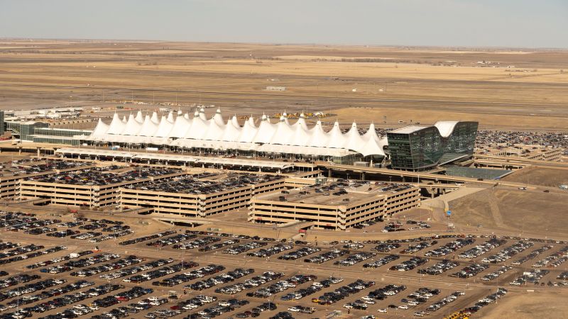 Passengers evacuated from plane onto Denver runway after landing gear issue sparked fire and left 1 injured | CNN