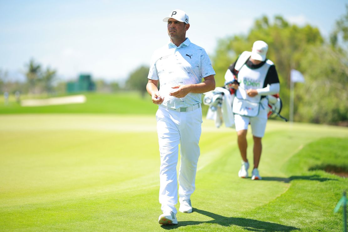 Woodland walks to the tee box of the 10th hole during the second round of the 2023 Mexico Open.