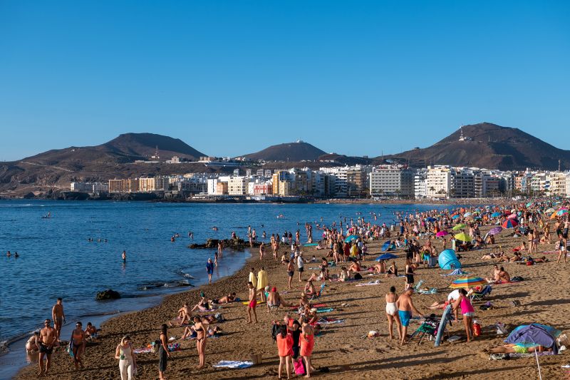 Large group of people at the beach Las Palmas de Gran Canaria, Canary Islands, Spain