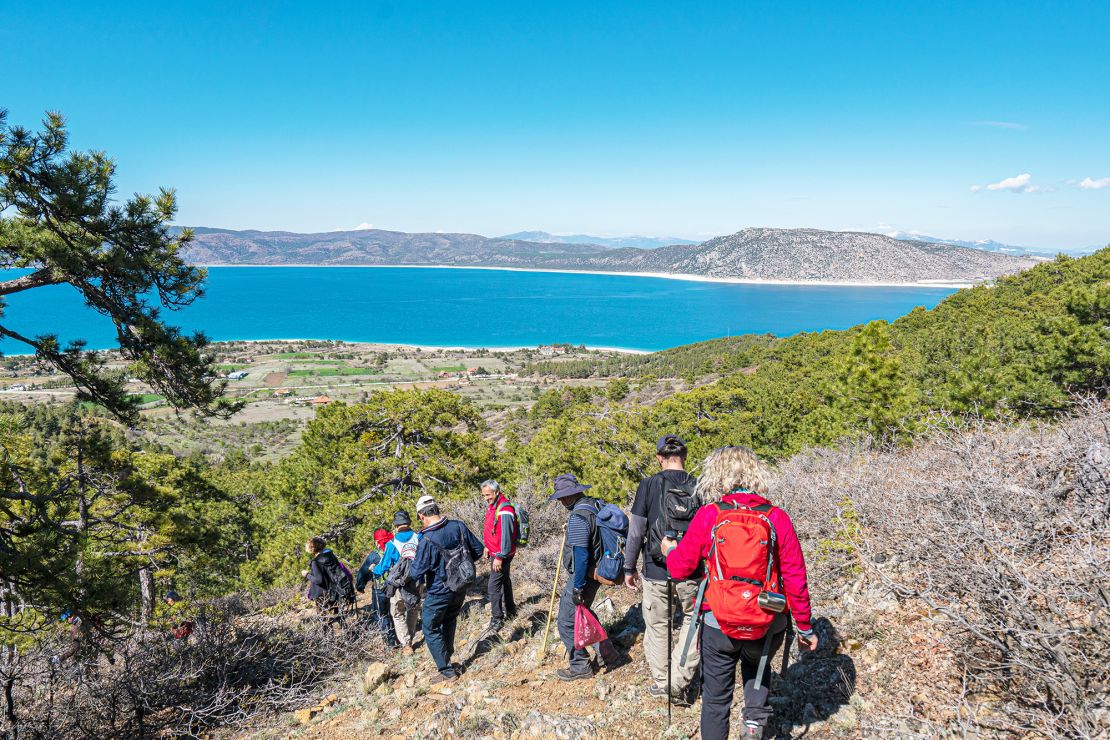 Hikers explore the trails around Lake Salda.