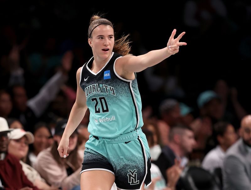Ionescu celebrates a three-point shot in the second half of the New York Liberty's game against the Connecticut Sun.