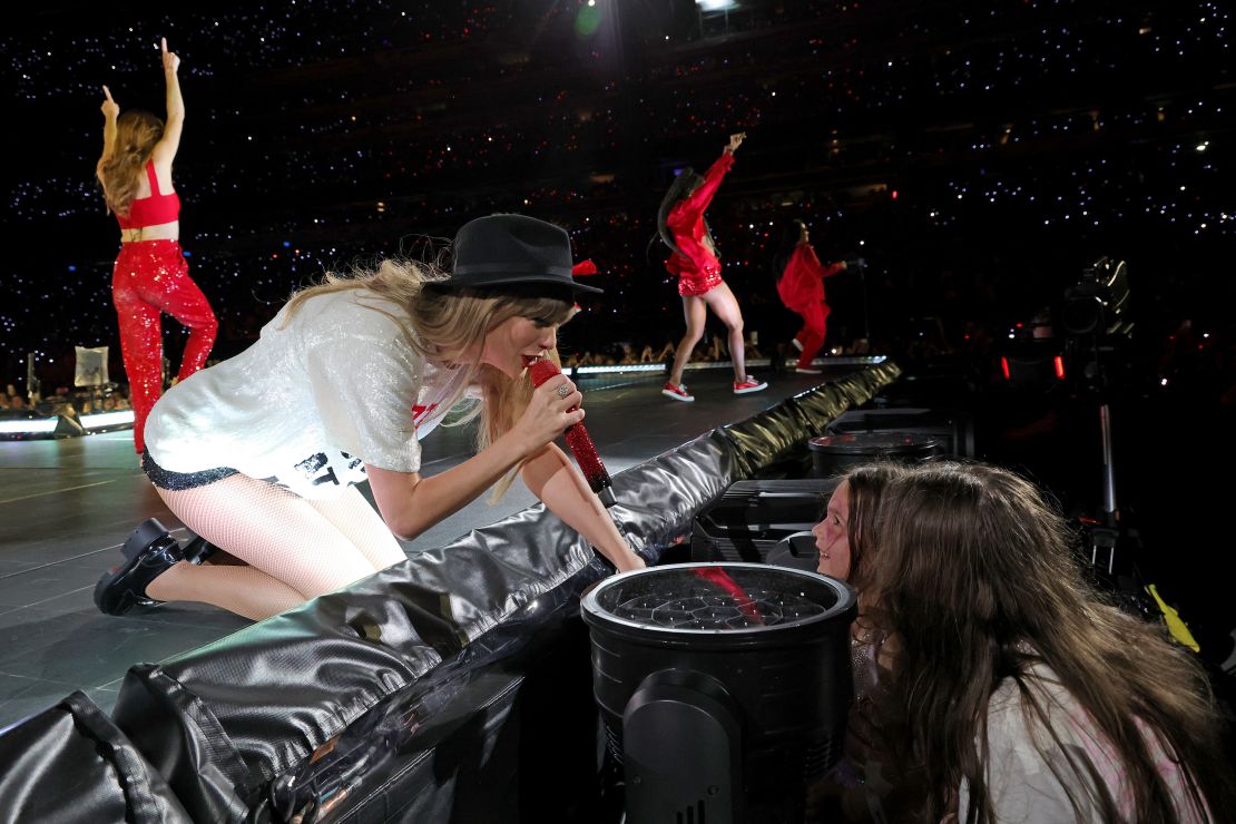 The singer greets a young fan in May at MetLife Stadium in East Rutherford, New Jersey.