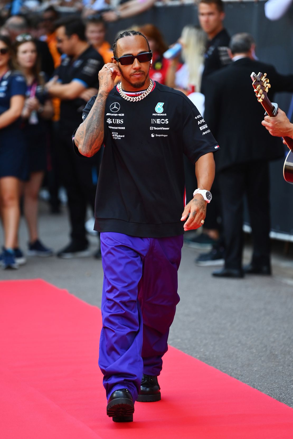 British driver Lewis Hamilton of Mercedes looks on from the drivers parade before the Formula 1 Grand Prix at the Circuit de Monaco on May 28, 2023.