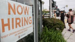 LOS ANGELES, CALIFORNIA - JUNE 02: A 'Now Hiring' sign is displayed outside a resale clothing shop on June 2, 2023 in Los Angeles, California. Today’s U.S. labor report shows that employers added 339,000 jobs in May with sectors including construction, healthcare, business services and transportation adding jobs with wages showing 4.3 percent growth over the same period last year. (Photo by Mario Tama/Getty Images)