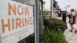 LOS ANGELES, CALIFORNIA - JUNE 02: A 'Now Hiring' sign is displayed outside a resale clothing shop on June 2, 2023 in Los Angeles, California. Today’s U.S. labor report shows that employers added 339,000 jobs in May with sectors including construction, healthcare, business services and transportation adding jobs with wages showing 4.3 percent growth over the same period last year. (Photo by Mario Tama/Getty Images)