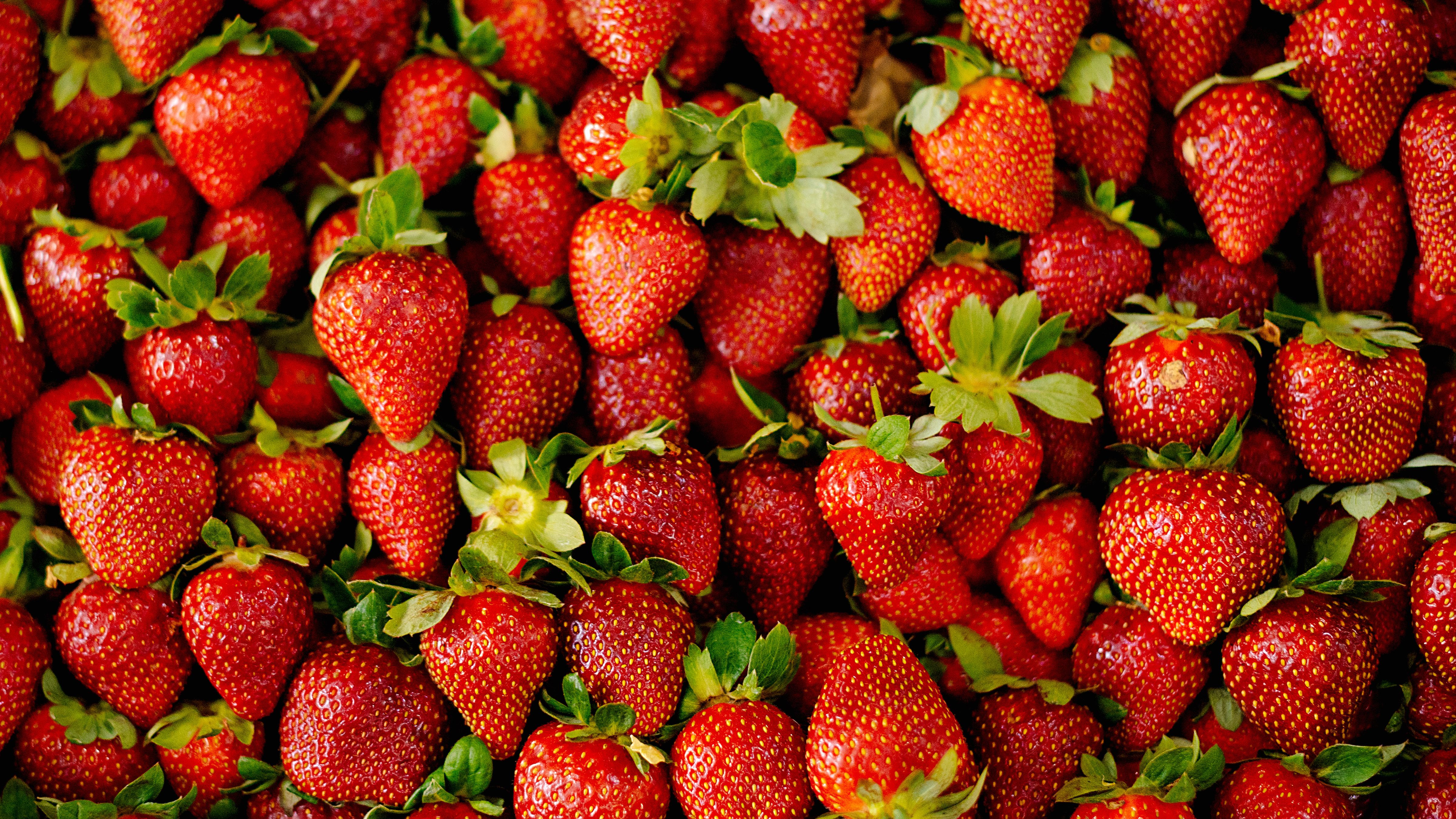 Lots of fresh strawberries sold in the market
