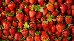 Lots of fresh strawberries sold in the market