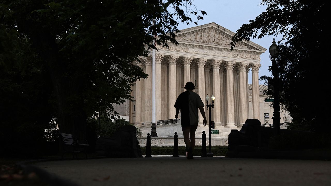 A pedestrian is seen close to the US Supreme Court on June 5, 2023 in Washington, DC.