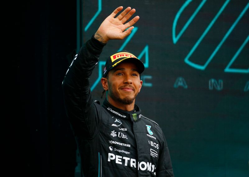 Third placed Lewis Hamilton of Great Britain and Mercedes celebrates on the podium during the F1 Grand Prix of Canada at Circuit Gilles Villeneuve on June 18, 2023 in Montreal, Quebec.