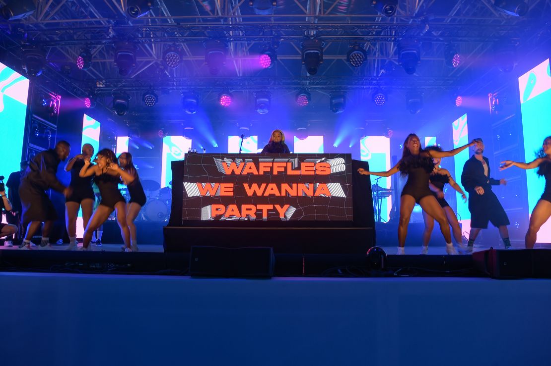 Uncle Waffles, surrounded by dancers, performs onstage during an event in Cannes, France, in June 2023.