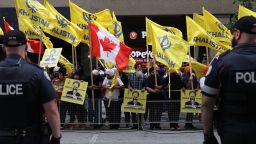 TORONTO, ON, CANADA - JULY 8 : Police officers stand guard as Pro-Khalistan supporters gather for a demonstration in front of the Indian Consulate in Toronto, Ontario, Canada on July 8, 2023. Pro-India counter protestors also gathered outside the Indian Consulate for a counter protest. (Photo by Mert Alper Dervis/Anadolu Agency via Getty Images)