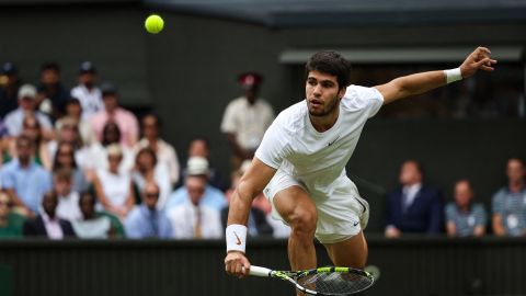 Spain's Carlos Alcaraz returns the ball to Serbia's Novak Djokovic during their men's singles final tennis match on the last day of the 2023 Wimbledon Championships at The All England Tennis Club in Wimbledon, southwest London, on July 16, 2023.