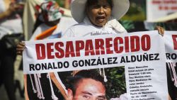 Relatives of missing persons hold signs with photos of their loved ones during a march against the government's ban on searches for the disappeared, which was implemented after an attack on prosecutors during one of the searches in recent days, in Guadalajara, Jalisco State, Mexico, on July 16, 2023. According to the latest official report published in May by the Mexican government, more than 100,000 people have disappeared in Mexico, and more than 15,000 are from the state of Jalisco. (Photo by ULISES RUIZ / AFP) (Photo by ULISES RUIZ/AFP via Getty Images)