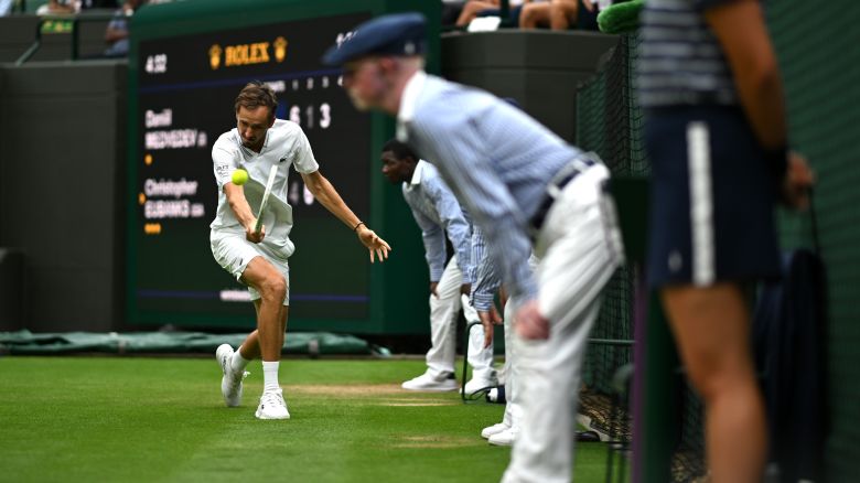 LONDON, ENGLAND - JULY 12: Daniil Medvedev plays a backhand close to the line judges against Christopher Eubanks of United States in the Men's Singles Quarter Final match during day ten of The Championships Wimbledon 2023 at All England Lawn Tennis and Croquet Club on July 12, 2023 in London, England. (Photo by Shaun Botterill/Getty Images)