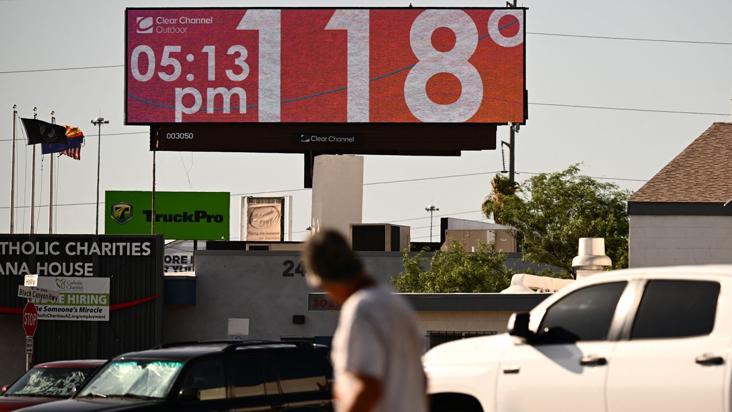 A billboard displays a temperature of 118 degrees Fahrenheit during a record heat wave in Phoenix, Arizona on July 18, 2023.