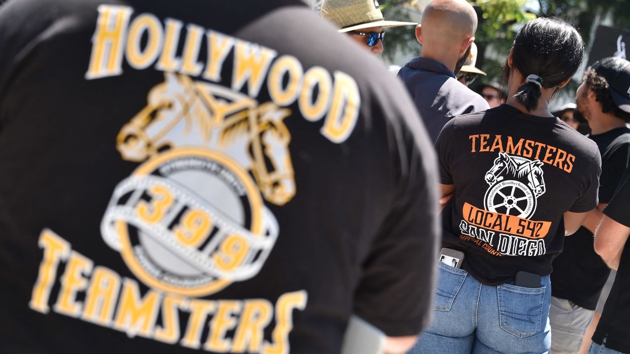 Teamsters Union members join members of the Writers Guild of America and the Screen Actors Guild on strike outside Amazon Studios in Culver City in July 2023.