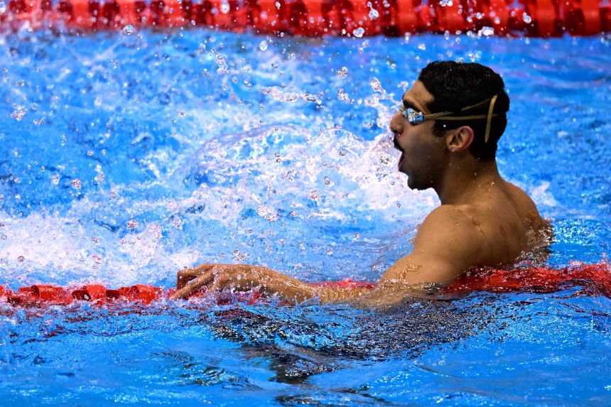 Elaraby reacts after competing in a semifinal heat of the men's 50m butterfly at the 2023 World Aquatics Championships.