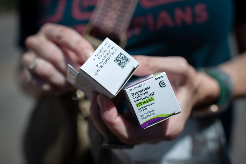A testosterone supply is held after being refilled in Thomasville, Alabama.
