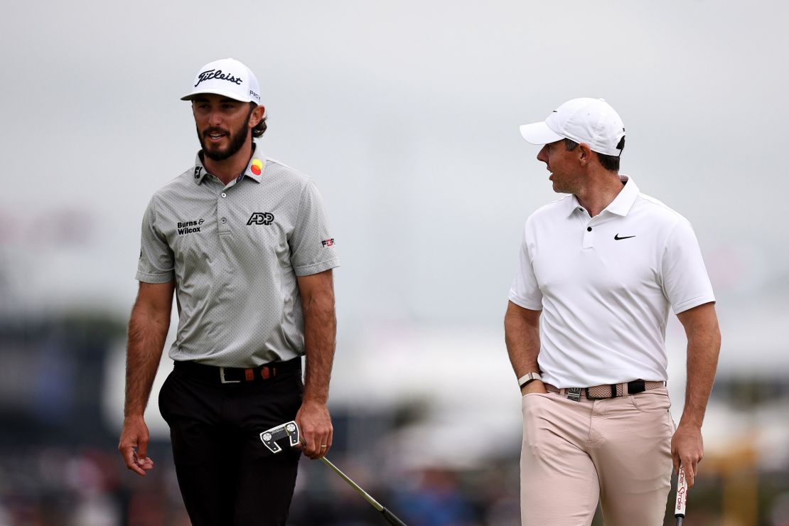 Homa (left) and McIlroy chat during The 2023 Open Championship at Royal Liverpool Golf Club in Hoylake, England.