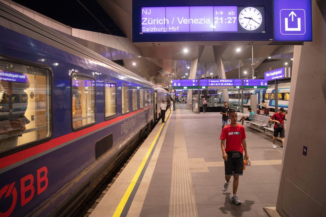 Passengers are seen on the platform in front of the Nightjet train line Vienna-Venice (-Zurich) of the Austrian Federal Railways. Night trains are making a comeback in Europe, thanks to their low-carbon footprint.