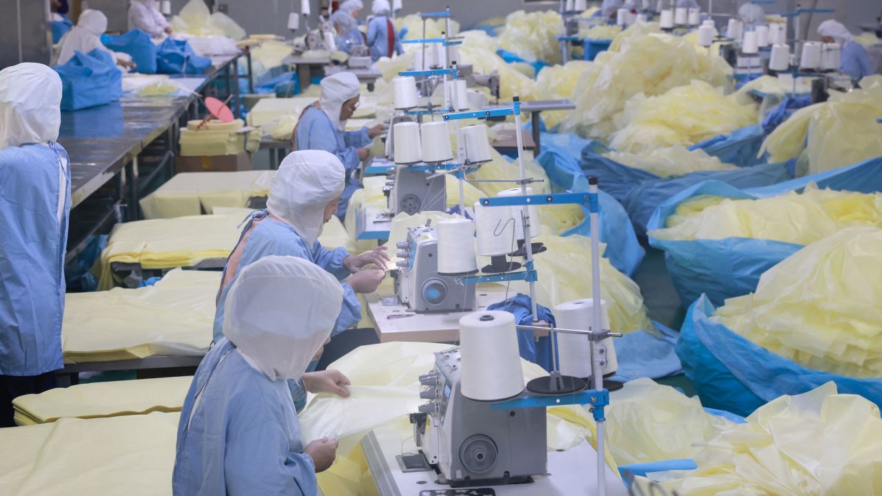 Workers produce medical supplies that will be exported to the US at a factory in Nantong, in China's eastern Jiangsu province on Angust 3, 2023. (Photo by AFP) / China OUT (Photo by STR/AFP via Getty Images)