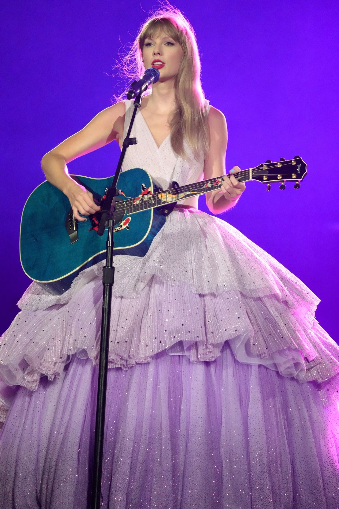 At the Santa Clara show in California on July 28, Swift was a vision in violet. Her tiered tulle gown was designed by Nicole + Felicia.