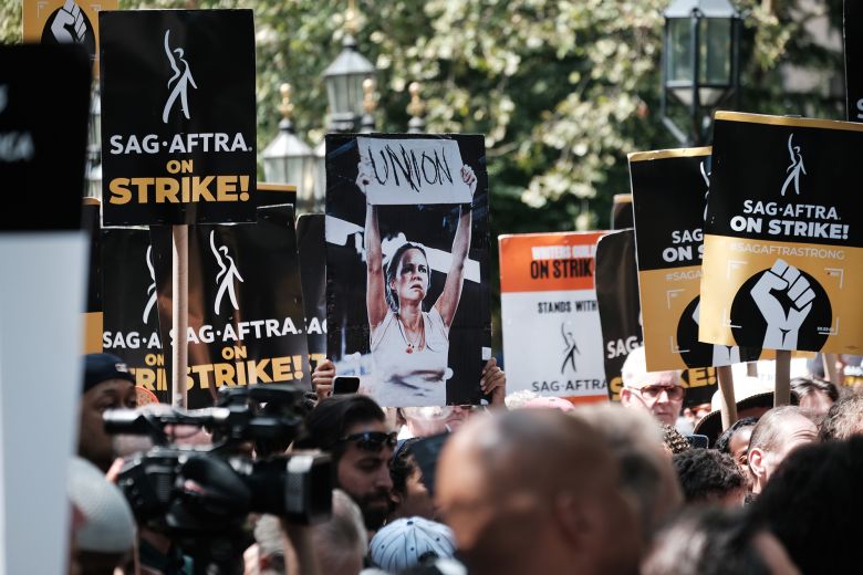 Members of the actors SAG-AFTRA union join with screenwriters as they listen to SAG-AFTRA President Fran Drescher at New York City Hall on August 1, 2023.