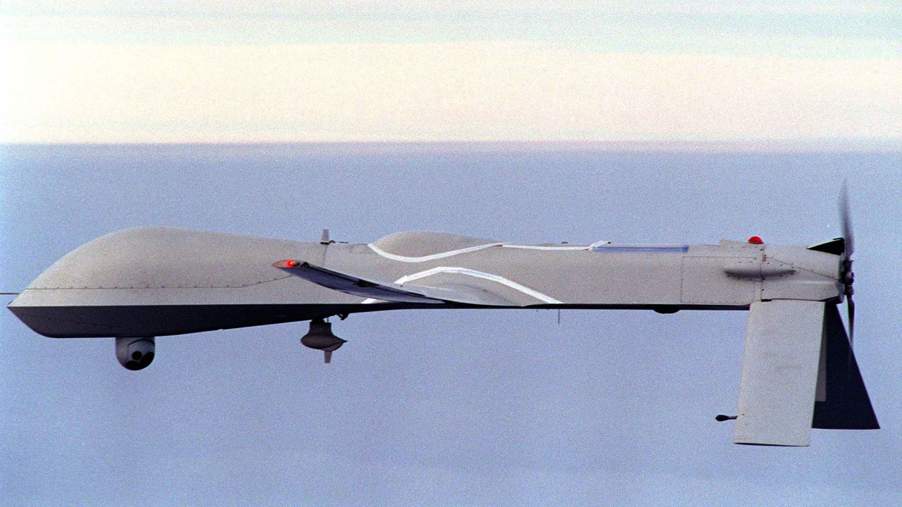 CALIFORNIA - DECEMBER 5:  (FILE PHOTO) An unmanned "Predator" drone flies near the aircraft carrier USS Carl Vinson December 5, 1995 off the coast of California. Reports indicate that the CIA recently used a "Predator" drone like the one shown in this U.S. Navy handout photo to kill a suspected al Qaeda operative in Yemen. (Photo by Petty Officer 3rd Class Jeffrey S. Viano/U.S. Navy /Getty Images)