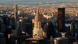 NEW YORK, NY - AUGUST 8: The sun sets on midtown Manhattan and the Chrysler Building seen from the 86th floor of the Empire State Building on August 8, 2023, in New York City.  (Photo by Gary Hershorn/Getty Images)