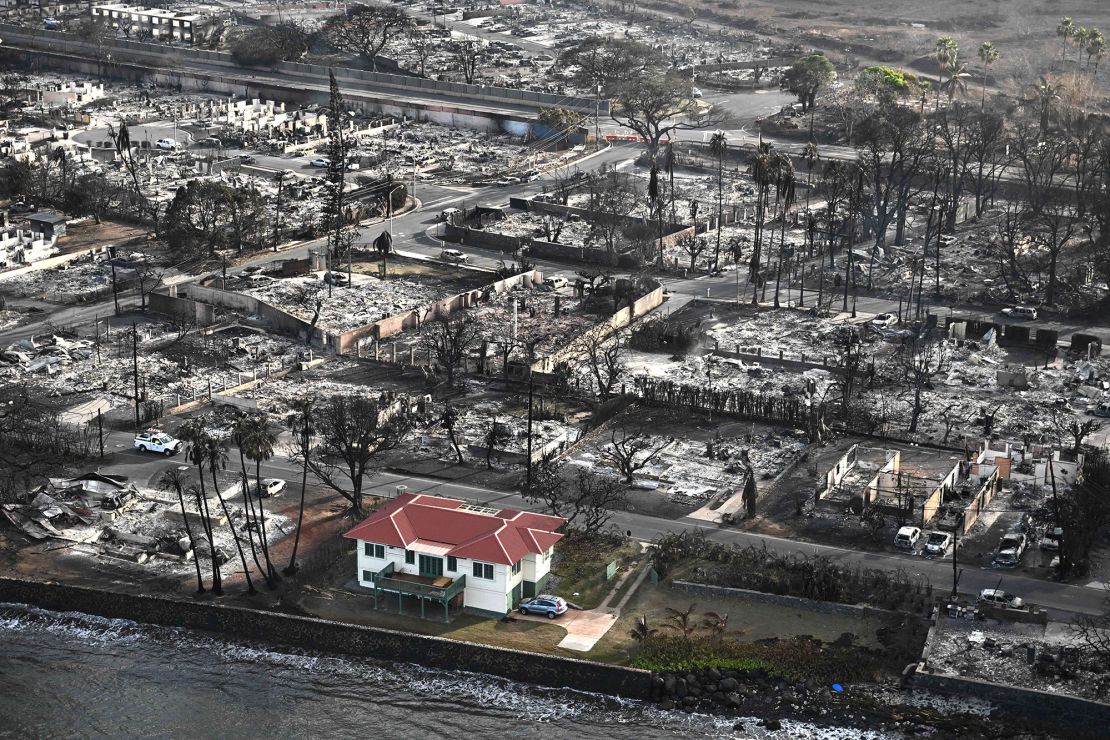An aerial image shows destroyed homes and buildings in the aftermath of wildfires in Lahaina, Hawaii on August 10, 2023. The fires became a focus point for conspiracies and misinformation online.