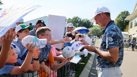 MEMPHIS, TENNESSEE - AUGUST 12: Jordan Spieth of the United States signs autographs for young fans after his round during the third round of the FedEx St. Jude Championship at TPC Southwind on August 12, 2023 in Memphis, Tennessee. (Photo by Andy Lyons/Getty Images)