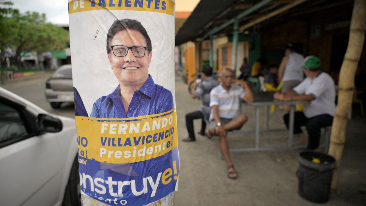 An advertisement for slain Ecuadorean presidential candidate Fernando Villavicencio is seen in Canuto, Ecuador, on August 19, 2023, on the eve of the presidential election and referendum on mining and petroleum. Ecuador holds a presidential election on Sunday after a campaign marked by the murder of a top candidate and vows to tackle the lawlessness that has engulfed the once-peaceful nation. Alongside the presidential vote, two key referendums are taking place in one of the world's most biodiverse countries. One will ask voters to choose whether to continue oil drilling in the Amazon, and another focuses on whether to forbid mining activities in the Choco Andino forest. (Photo by Rodrigo BUENDIA / AFP) (Photo by RODRIGO BUENDIA/AFP via Getty Images)