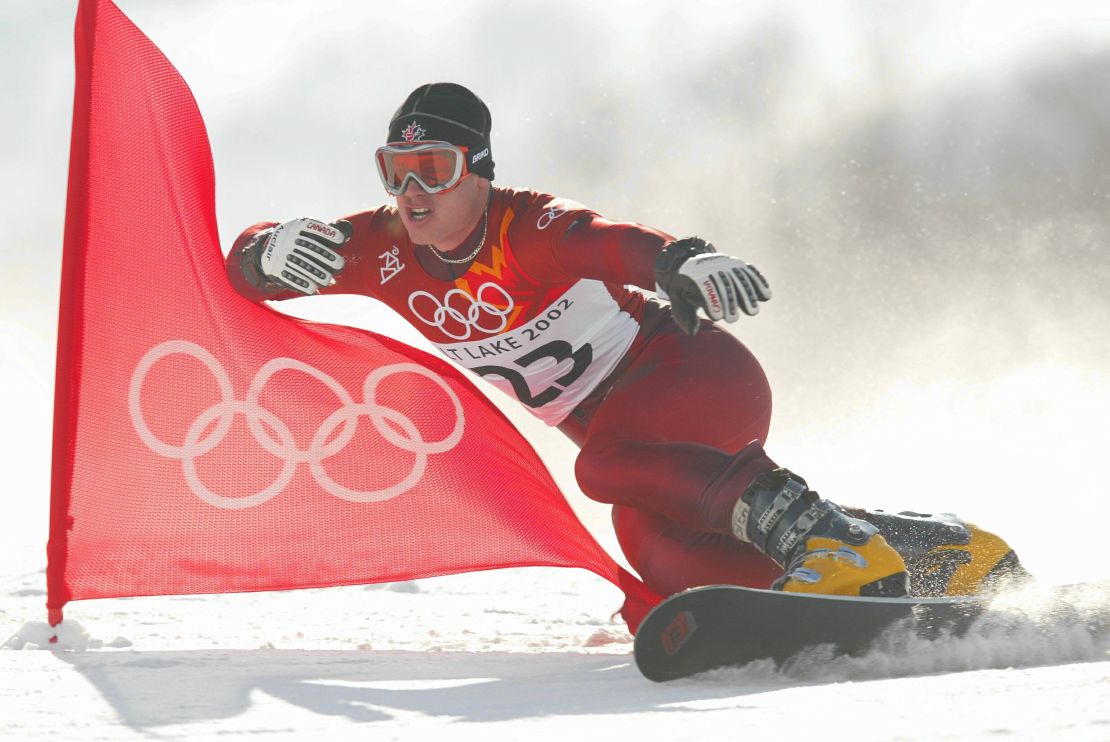 Ryan Wedding of Canada competes in the qualifying round of the men's parallel giant slalom snowboarding event during the Salt Lake City Winter Olympic Games at the Park City Mountain Resort in Park City, Utah.