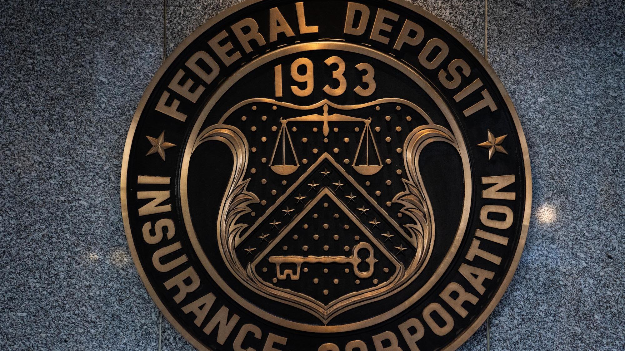 The Federal Deposit Insurance Corp. (FDIC) headquarters in Washington, DC, US, on Wednesday, Aug. 23, 2023. US banking watchdogs will next week propose requiring that banks with as little as $100 billion in assets issue enough long-term debt to cover capital losses if they ever failed.