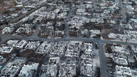 LAHAINA, HAWAII - AUGUST 18: In an aerial view, burned cars and homes are seen in a neighborhood that was destroyed by a wildfire on August 18, 2023 in Lahaina, Hawaii. At least 111 people were killed and thousands were displaced after a wind driven wildfire devastated the towns of Lahaina and Kula early last week. Crews are continuing to search for missing people. (Photo by Justin Sullivan/Getty Images)