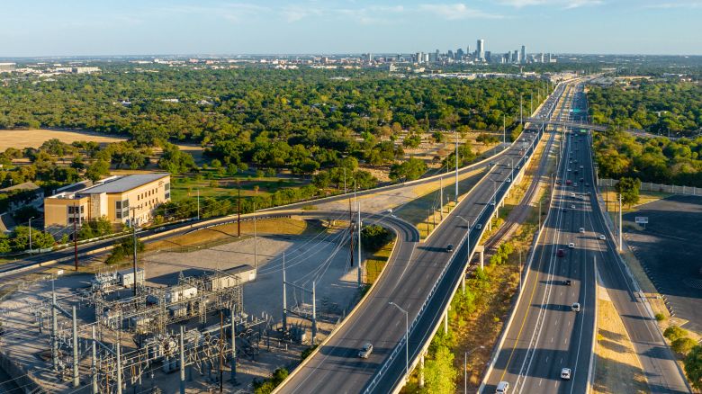 Texas Electric Grid Under Strain As Triple-Digit Temperatures Continue. An aerial view of a power plant next to a freeway overpass on August 18, 2023 in Austin, Texas. The Electric Reliability Council of Texas (ERCOT) has asked Texans to conserve power as a prolonged heat wave continues sweeping across the state. Today marks 42 consecutive days of triple digit weather across the state.