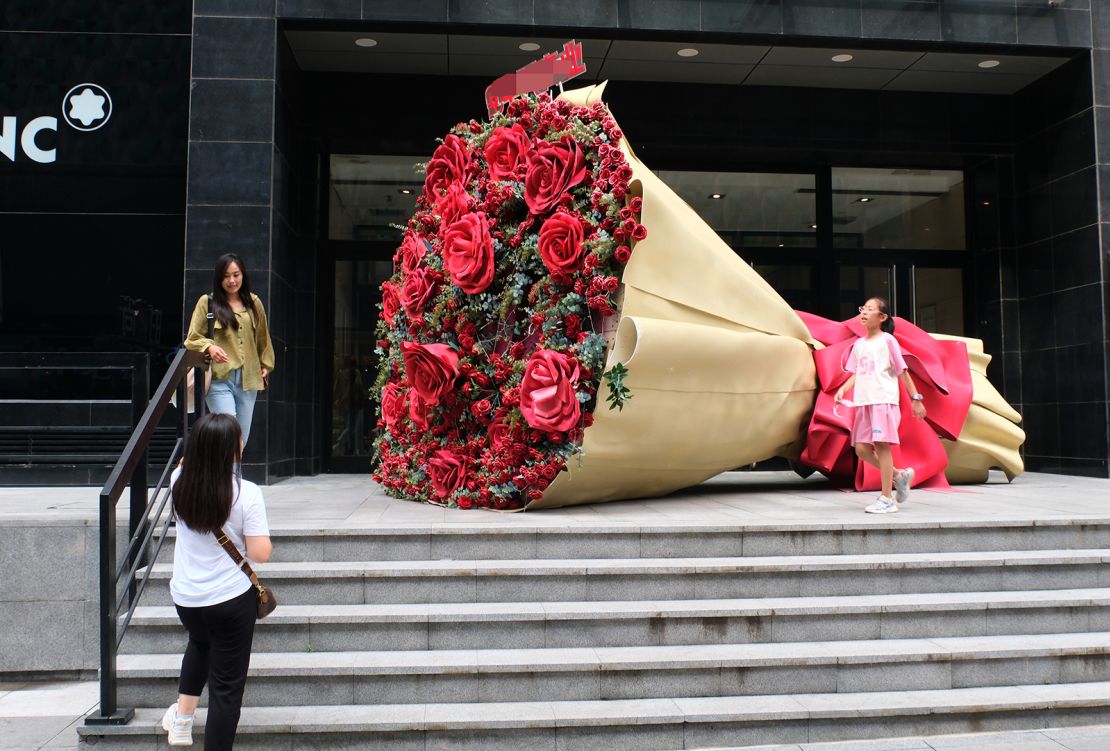 A red rose installation is on display at a commercial street ahead of Qixi Festival, or Chinese Valentine's Day, on August 20, 2023 in Shenyang, Liaoning province.