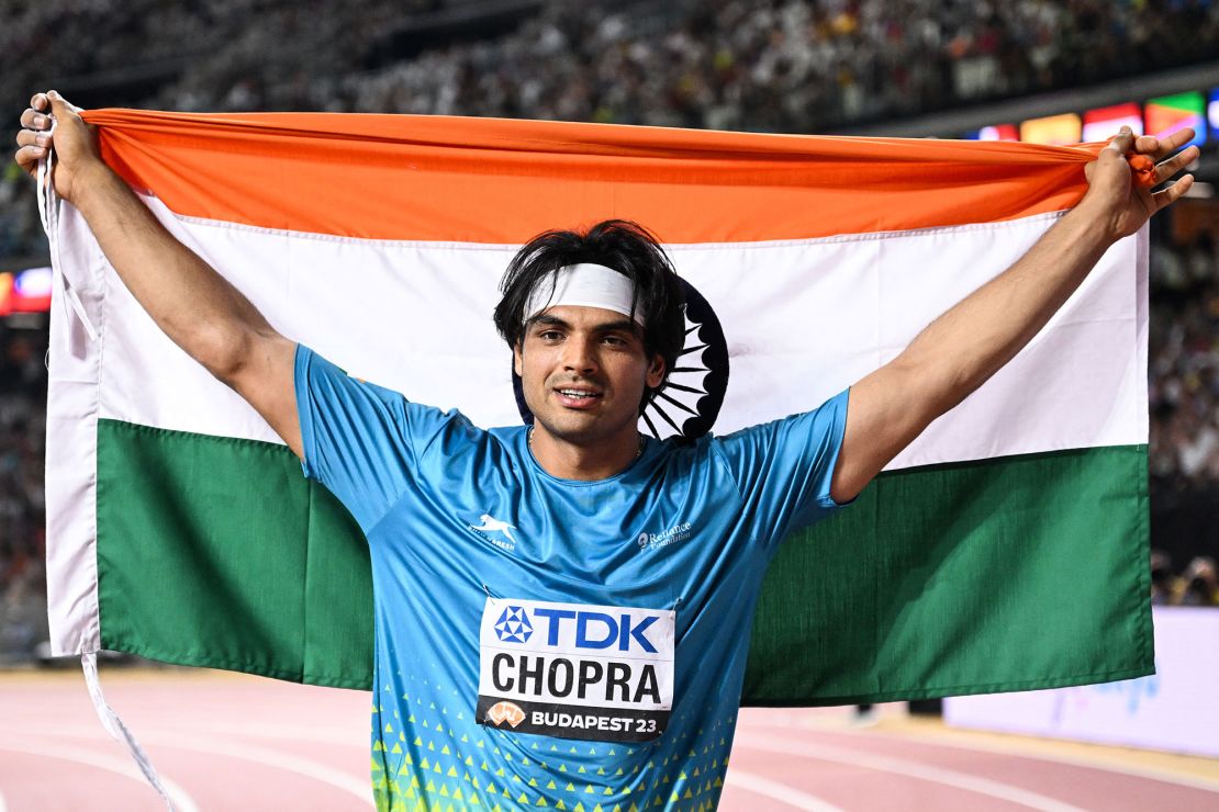 Chopra celebrates becoming world champion in Budapest, Hungary, last year.